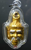 Amulette Sian Lersi masque de Lersi dorée.