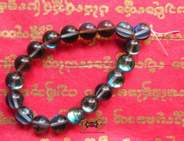 Chapelet de poignet Bouddhiste en verre bleu opalisé. magiedubouddha