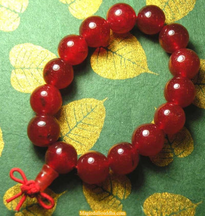 Mala de poignet en agate rouge La Magie du Bouddha.