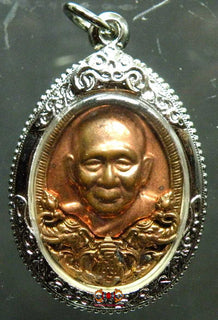 Médaille Roop Lor alchimique de Sa Sainteté Somdej Phra Sangharaj. magiedubouddha.com