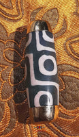 Beautiful green Tibetan Dzi beads with 9 eyes. 