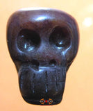 Perle de chapelet tibétain en forme de crâne humain.