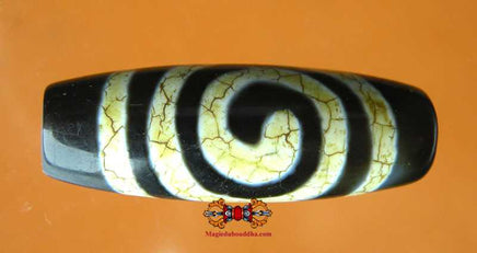 Dzi Tibétain avec motif en spirale. magiedubouddha