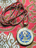 Amulette tibétaine miroir magique du bouddha de médecine