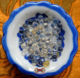 Relique Bouddiste perles sacrées Ringsel translucide dans un reliquaire scellé. La Magie du Bouddha.