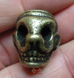 Perle de Mala Tibétain en bronze en forme de crâne humain souriant Citipati.