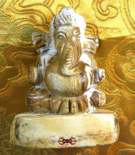Statuette de Ganesh en bois fossile magiedubouddha
