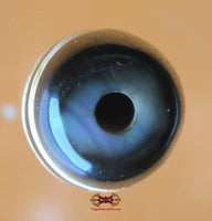 Dzi Tibétain avec motif en spirale. magiedubouddha
