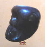 Grosse perle crâne Tibétain en cornaline sombre.