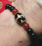 Bracelet Tibétain pour la force et le courage - avec Dzi peau de Tigre.