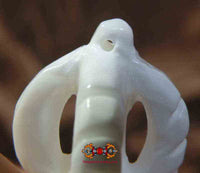 Pendentif Tibétain double dorje en conque sculptée