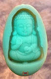 Pendentif galet en pierre fluorescente Bébé Bouddha.